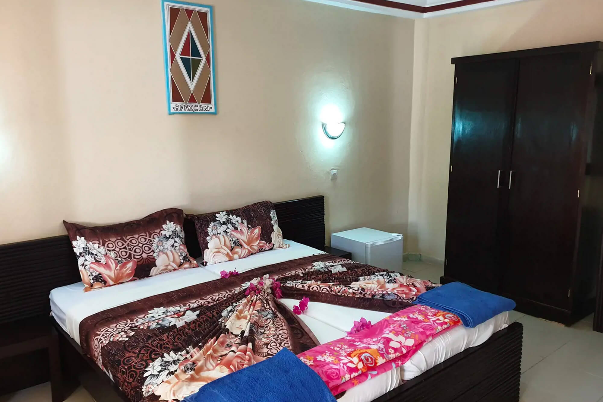 Kamer en bed van het Badala park hotel en resort in Gambia